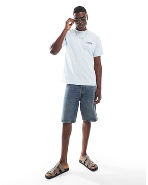 Dr Denim Trooper relaxed fit t-shirt in washed light blue daisy print