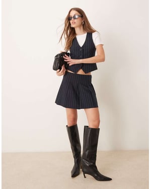ASOS DESIGN tailored pleated mini skirt in navy stripe