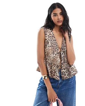 ASOS DESIGN sleeveless tie front top in animal print