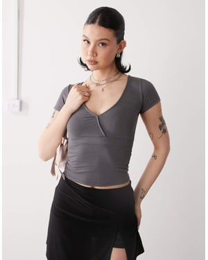 Motel machiko plunge front wrap top in charcoal grey