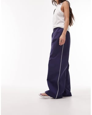 Topshop premium wide leg side pipe track pant in navy