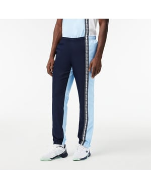 Lacoste Slanke trainingsbroek voor heren met kleurblokken (Marineblauw)