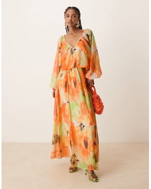 ASOS DESIGN långärmad puff blus maxiklänning i kraftigt orange blommönster