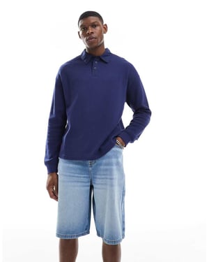 ASOS DESIGN längre denimshorts i ljus tvättblå