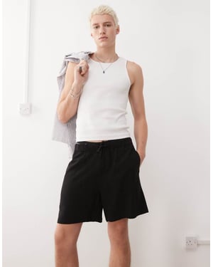 Återvunnen vintage linneblandning shorts i svart