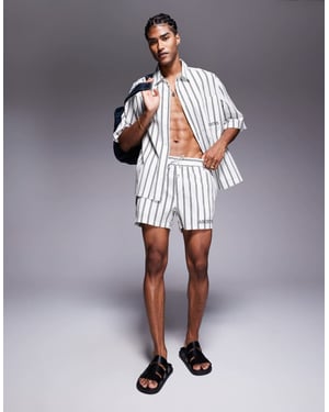 ASOS DESIGN matchande randiga shorts i kort längd med broderi i vitt