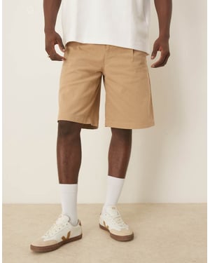 ASOS DESIGN långa plisserade shorts med dubbla dartar i beige