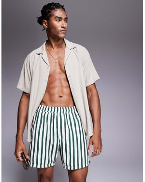 ASOS DESIGN badshorts i medellängd i grönrandig