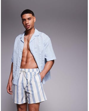 ASOS DESIGN badshorts i mellanlängd i blå randig