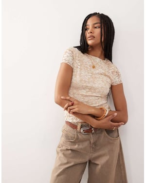 Återvunnen vintage spetsbabytee i smörmjölk