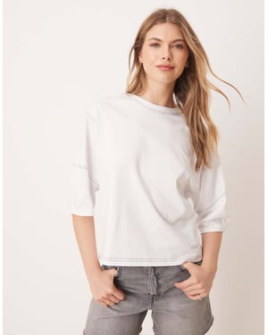ASOS DESIGN boxy crop t-shirt med kontrastsömmar i vitt