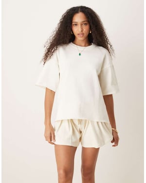 ASOS DESIGN stickad slub avslappnad t-shirt i crème