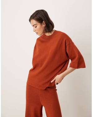 ASOS DESIGN stickad strukturerad t-shirt i rostfärg
