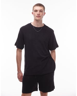 ARKET koord ren bomull mjukt touch frotté oversized t-shirt i svart
