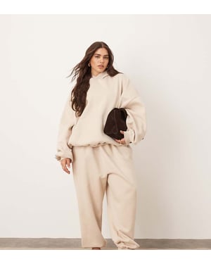 ARRANGE Curve oversize premium tungvikts jogger med mudd i havrebeige