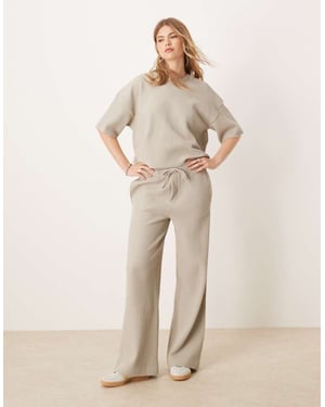 ASOS DESIGN tung waffle co-ord joggers i ljus khaki