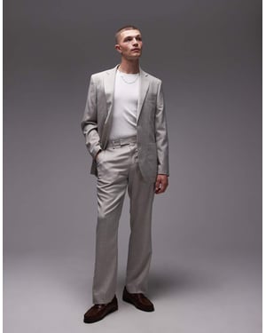 Topman raka kostymbyxor i sten
