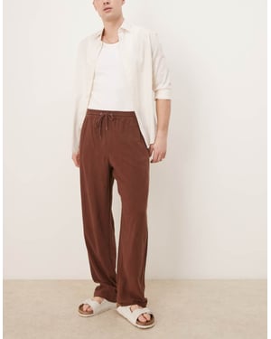ASOS DESIGN baggy fit linneblandade byxor med elastisk midja i brun