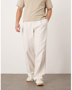 ASOS DESIGN avslappnade smarta vida byxor med framveck i beige textur och elastisk midja