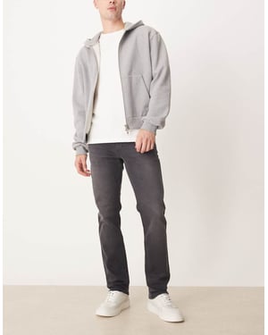 ASOS DESIGN slim jeans i tvättad svart