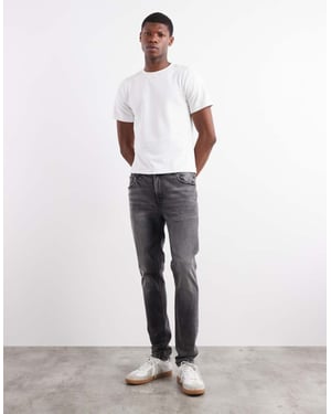 ASOS DESIGN skinny jeans i tvättad svart