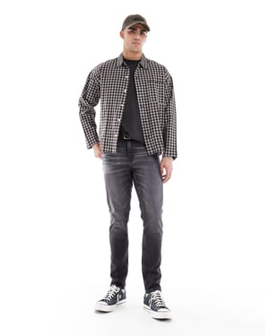ASOS DESIGN skinny jeans i tvättad svart