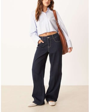 AWARE Rena hög midja vida jeans i mörkblå tvätt