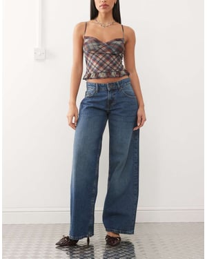 Motel rymliga extra vida låg midja jeans i collegeblå