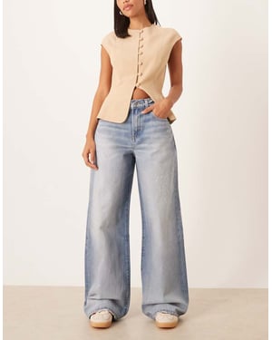 Calvin Klein Jeans vida byxor med stänkmönster i acid wash