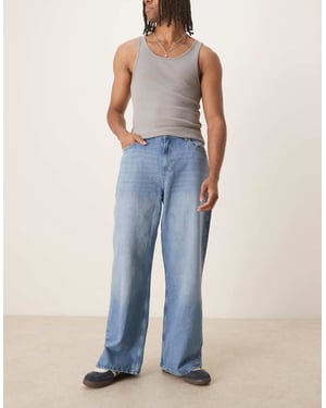 Återvunnen vintage baggy bred denimjeans i bleknad tvätt