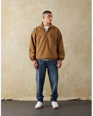 ASOS DESIGN stretch tapered jeans i mörk tvätt blå
