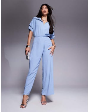 ASOS DESIGN draperad krage vidbenad jumpsuit i blått