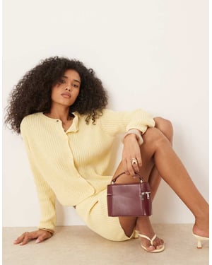 ASOS DESIGN välsittande stickad kofta i gult