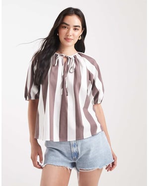 ASOS DESIGN puffärmsblus med knytdetalj i randig mönster