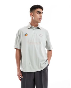 ASOS DESIGN oversized polo med textgrafik i grått