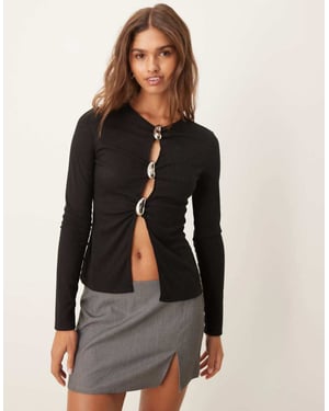 ASOS DESIGN rib long sleeve top with gold buttons in black