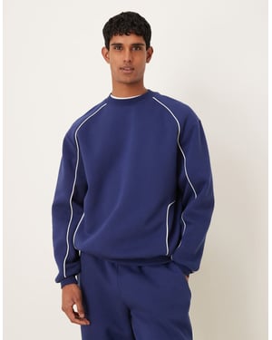 ASOS DESIGN avslappnad passform sweatshirt med piping i blått