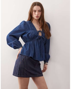 Återvunnen vintage långärmad topp med rynkad knytfront i ljusblå denim