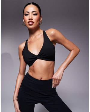 4505 soft touch light support twist front sports bra in black
