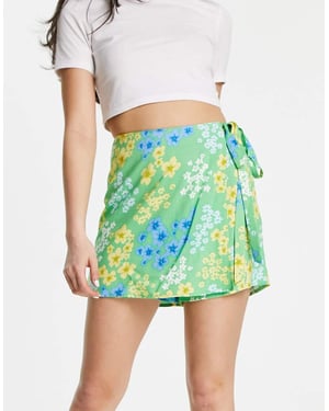 ASOS DESIGN wrap tie skort in green meadow floral print