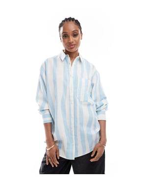 ASOS DESIGN Lång linneblandning oversized skjorta i suddig rand