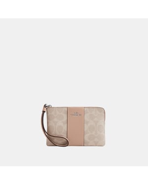 Corner Zip in Signature Canvas with Leather Stripe Bag