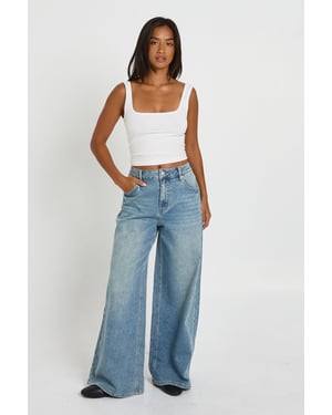 The Petite Mid Waist Wide Leg Jean