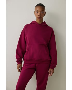 Oversized bomulls hoodie med ficka