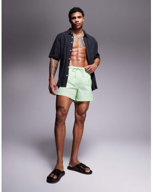 HUGO RED Fab tejplogo badshorts i ljusgrön