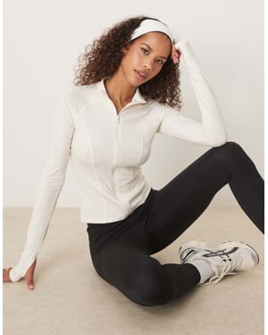 Gina Tricot Soft Touch sport seamless zip-up jacka i off-white
