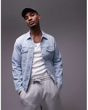 Tommy Jeans Ryan regular truckerjacka i medelblå tvätt