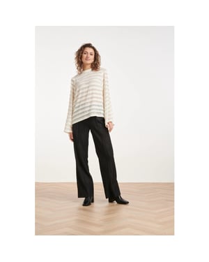 Smashed Lemon Zwarte pantalon met glitterstructuur en wijde pijpen |