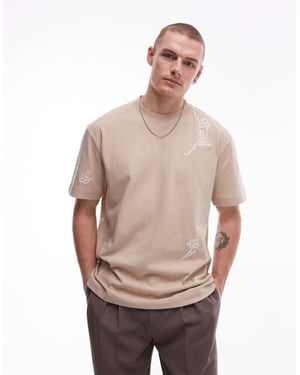 Topman avslappnad passform t-shirt med fram- och baksida blommönster i sten