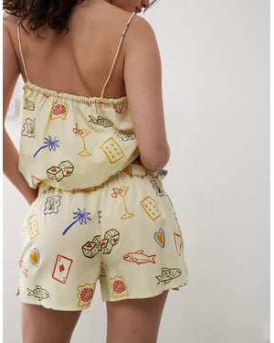 Reclaimed Vintage pull on relaxed beach short in yellow postcard print
